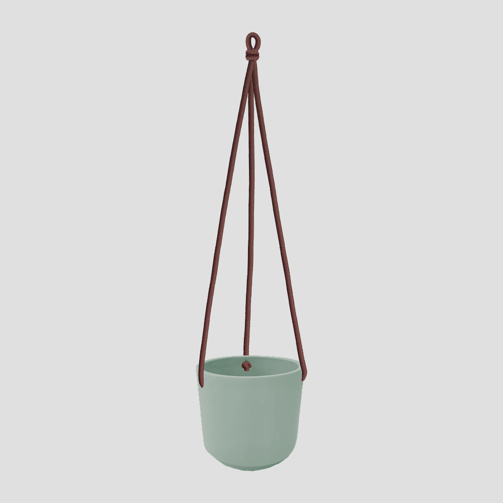 עציץ קרמיקה ירוק בהיר נתלה, משולב חבל חום כהה.